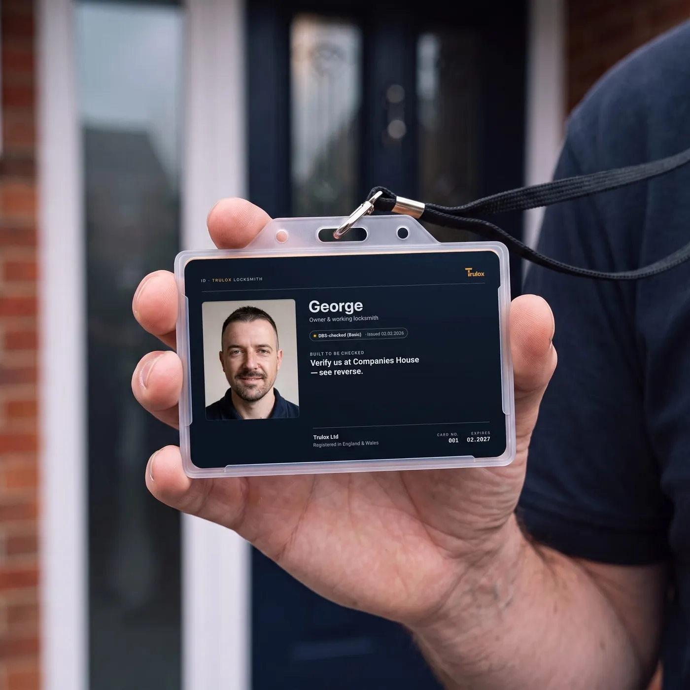 Trulox photo ID card on a lanyard, held up at a front door